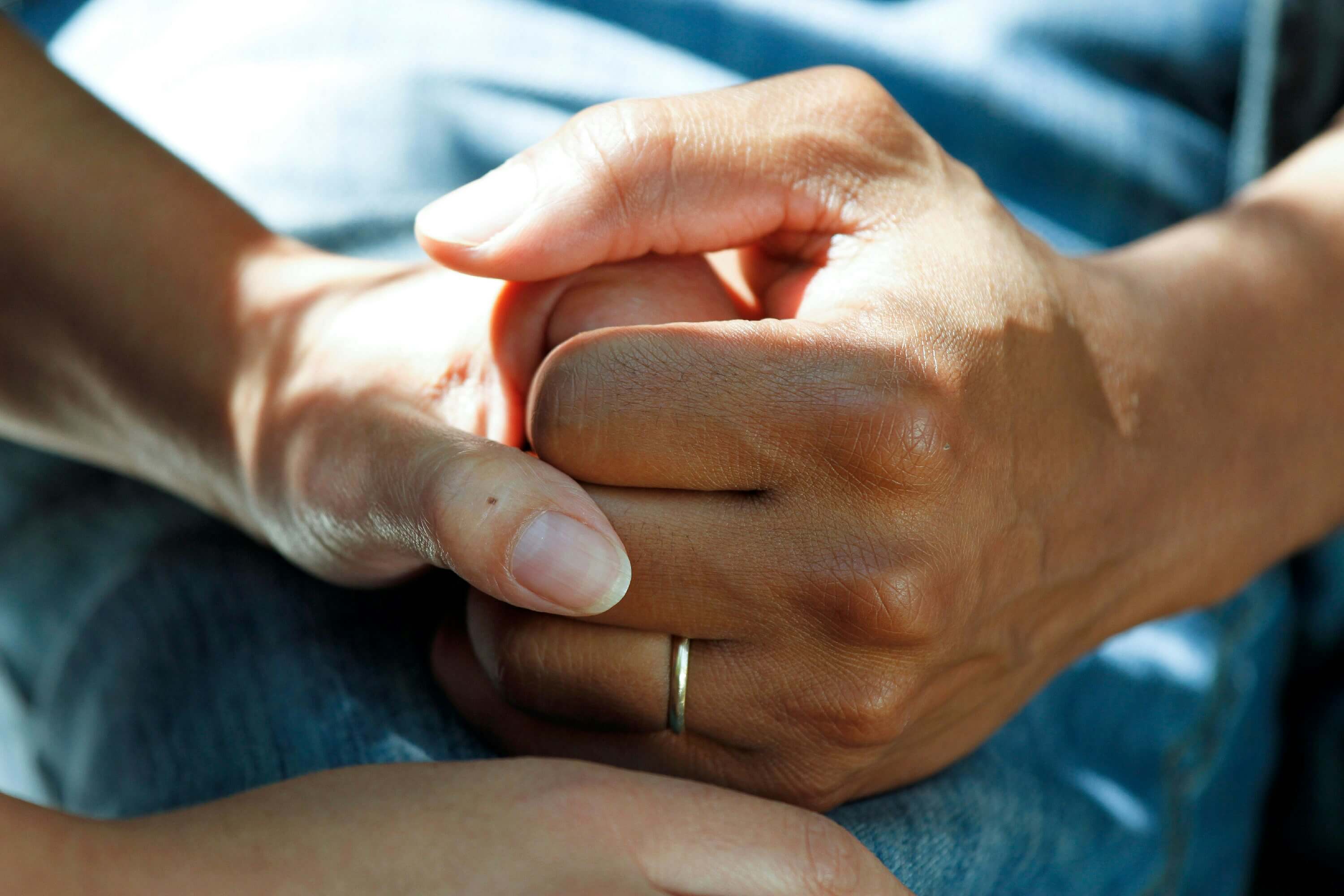 Image of a hand being held